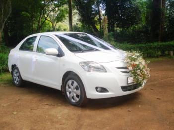 Photo of Conditioned Toyota Excellent White Car For Wedding Hires in Danweem.com